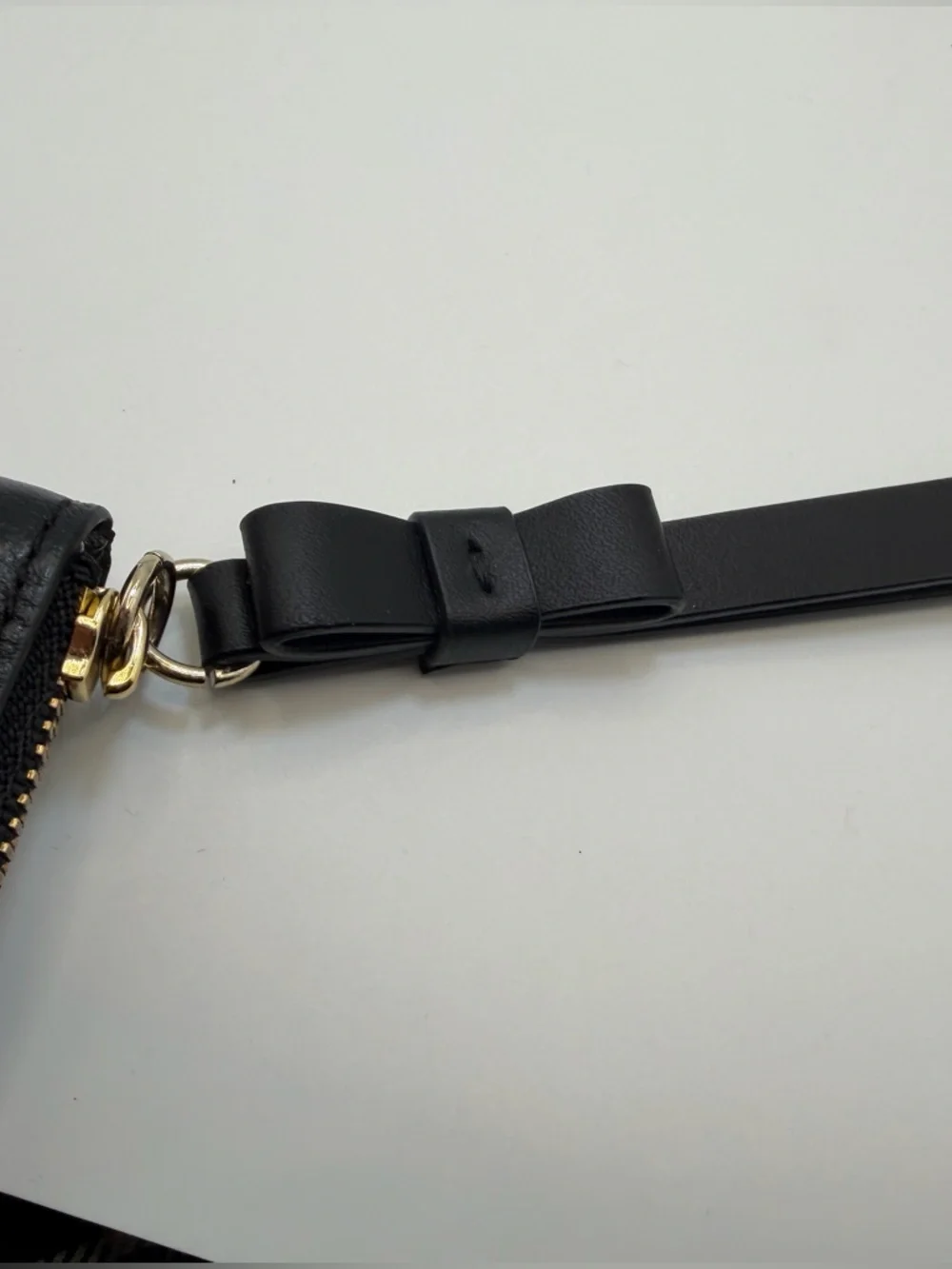 Kate Spade Black Leather Wristlet Bow Strap Gold Spade Logo  GUC